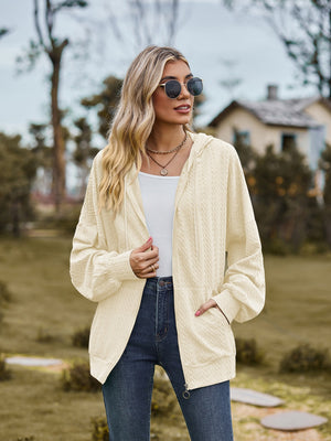 Textured knit dolman sleeve hoodie in Pastel Yellow with zip front and pockets.