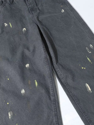 Grey sweatpants with loose fit and ink splash details
