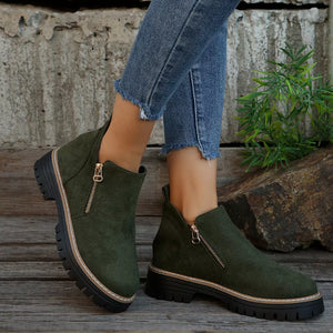 Green suede ankle boots with side zipper and rugged sole