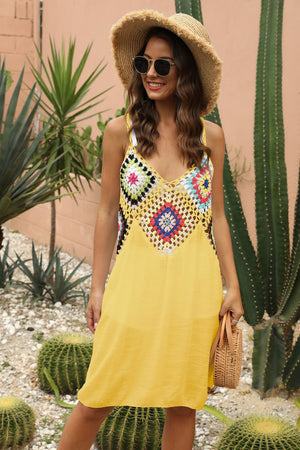 Yellow maxi dress with colorful crochet yoke and V-neckline.