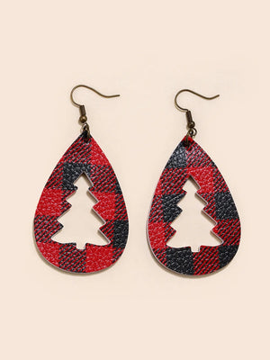 Plaid teardrop earrings with tree cutouts and bronze hooks.
