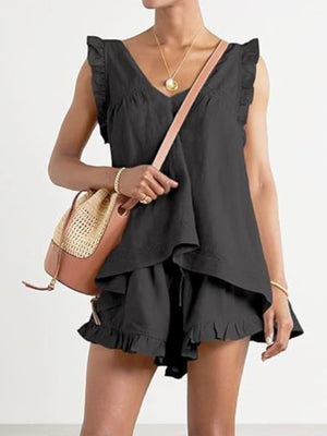Black ruffled V-neck sleeveless top and ruffled shorts set with drawstring waist.