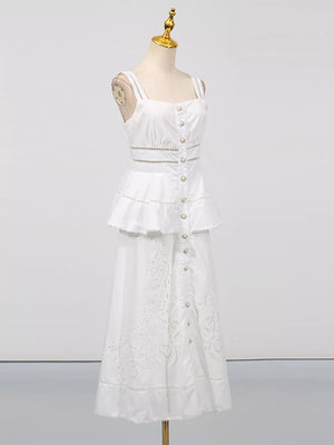 White eyelet embroidered midi dress with button front, tiered ruffle, and cutout waist detail.