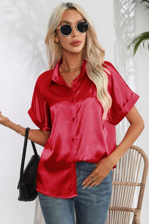 Scarlet satin blouse with cuffed short sleeves and button-down front.