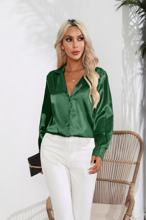 Glossy satin button-down blouse in dark green with a relaxed fit.