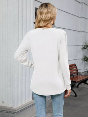 White V-neck long sleeve maternity t-shirt with a relaxed fit.