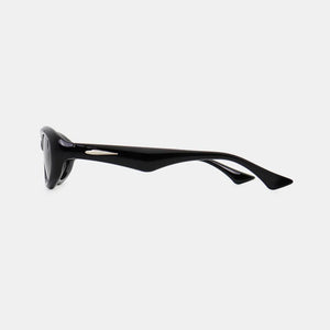 Black cat eye sunglasses with a chic, angular frame and silver accent.