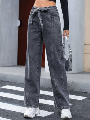 Belted wide-leg washed denim trousers in dark gray with a tie waist and front seams.