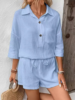 Sky blue cotton two-piece set with drawstring shorts and button-up shirt.