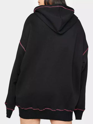 Black zip-up hoodie with pink contrast stitching and drawstring hood.