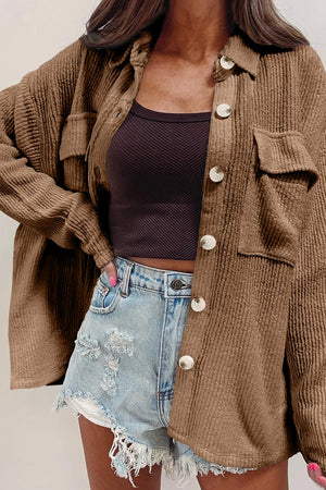 Textured corduroy overshirt in camel with patch pockets and button front.