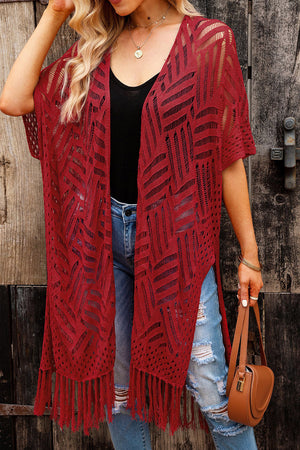 Rust open knit chevron fringe cardigan with short sleeves and a long hem.