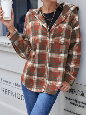 Plaid hooded shacket in brown with button front and chest pockets.