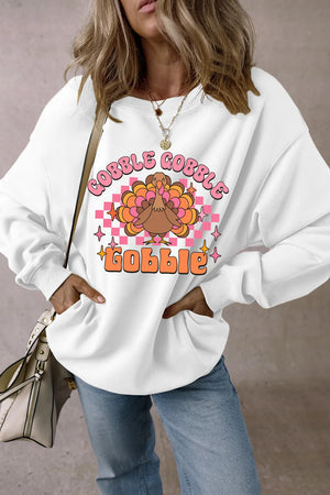 White graphic sweatshirt with retro turkey and "Gobble Gobble" text, crew neck, long sleeves.