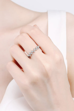 Silver zigzag diamond cluster ring on a hand