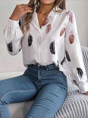 White feather print blouson sleeve button-down shirt with acrylic fabric.