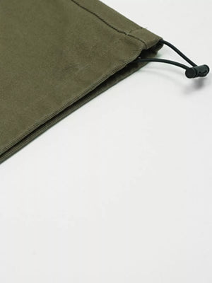 Olive green cargo pants with adjustable drawstring detail