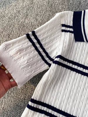 White cable knit polo t-shirt with navy stripes on collar and sleeves