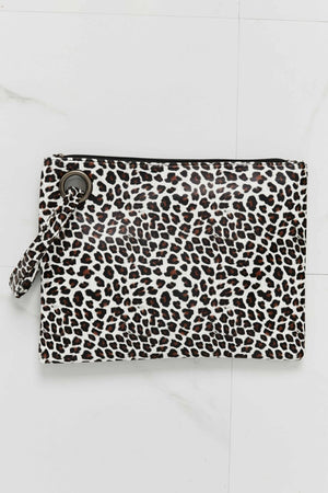 Leopard print clutch bag with wristlet strap and metal ring detail