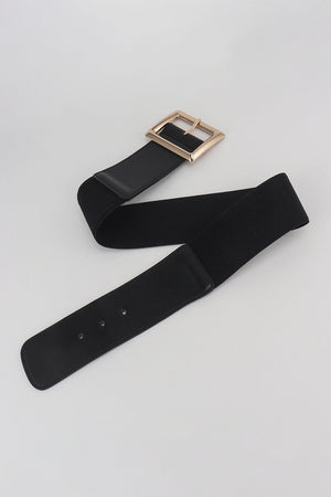Black elastic belt with gold sculptural buckle and faux leather trim