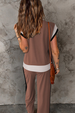Colorblock sportswear set with contrast trim in hot pink, black, brown, or light blue.