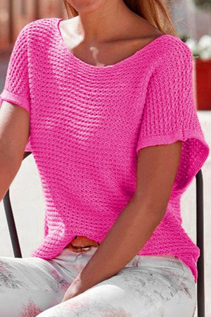 Hot Pink open-knit dolman sleeve top with a boat neckline.