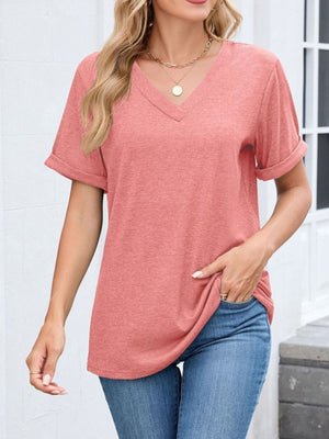 Pink v-neck t-shirt with cuffed short sleeves and a relaxed fit.