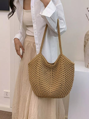Chevron woven straw shoulder bag in Khakis with braided straps and open weave.