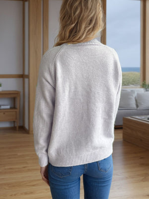 Textured knit raglan sleeve pullover in lilac with ribbed cuffs and hem