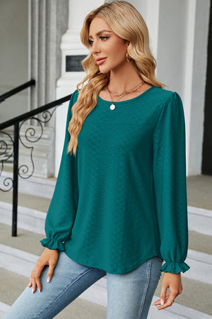 Teal textured puff sleeve blouse with ruffled cuffs, crew neck, and relaxed fit.
