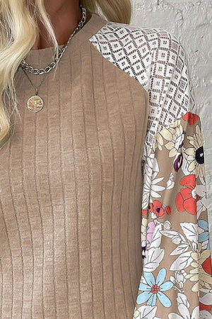 Ribbed tan top with lace and floral print sleeves.