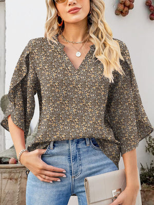 Floral print blouse with flutter sleeves and V-neck, 100% polyester