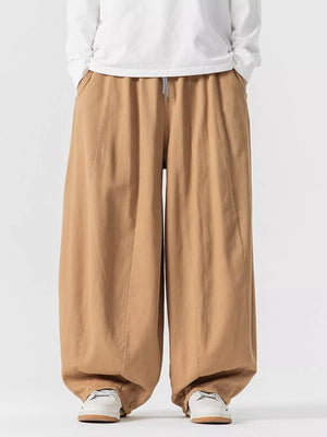 Relaxed fit drawstring sweatpants in Sherbet with wide legs and pockets.