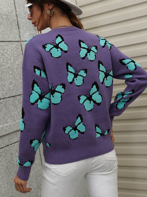 Purple knit crewneck sweater with allover teal butterfly motif