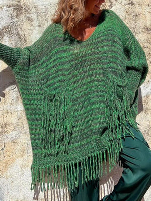 Green striped knit poncho sweater with fringe detail and v-neck