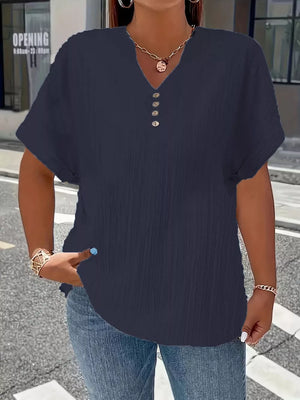 Navy blue textured v-neck t-shirt with decorative buttons and short sleeves.