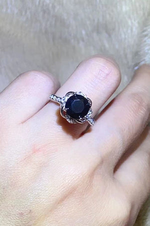 Black moissanite ring with floral halo and pave band