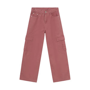 Oversized dusty pink denim cargo pants with large side pockets and a straight leg.