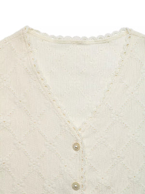 Textured apricot button-up maternity shirt with lace trim and pearl buttons.