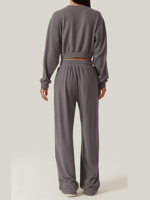 Dark gray knit lounge set with cropped sweatshirt and wide-leg pants