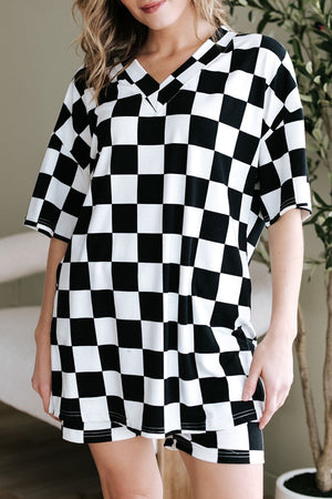 Black and white checkered v-neck t-shirt and shorts outfit set