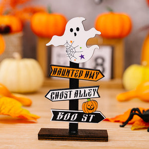 Halloween directional signpost with ghost, pumpkins, and spooky text: Haunted Hwy, Ghost Alley, Boo St.