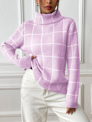 Grid-patterned lilac turtleneck knit pullover sweater with a high neck and long sleeves.