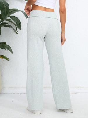 Light gray palazzo trousers with a fold-over waistband, wide leg, and casual knit fabric.