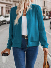 Quilted bomber jacket in French Blue with zip closure and crew neck.