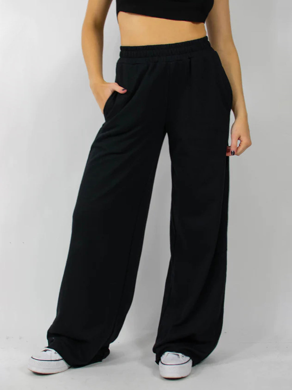 Black wide-leg loungewear pants with pockets and elastic waist