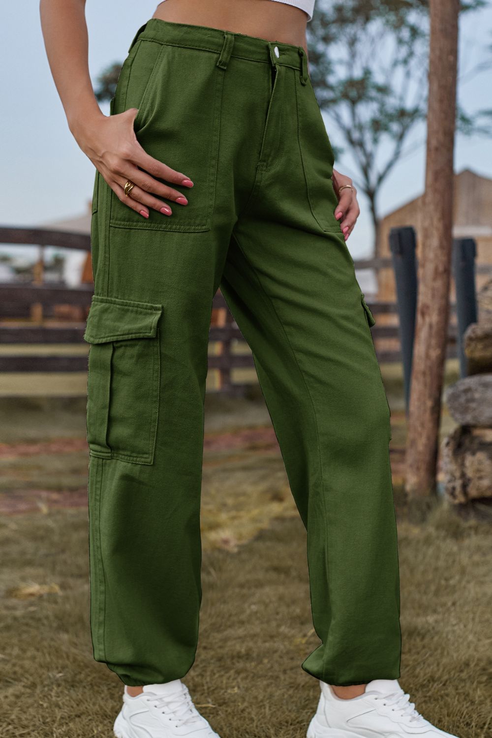 Army green cargo pants with multiple pockets and a relaxed fit.