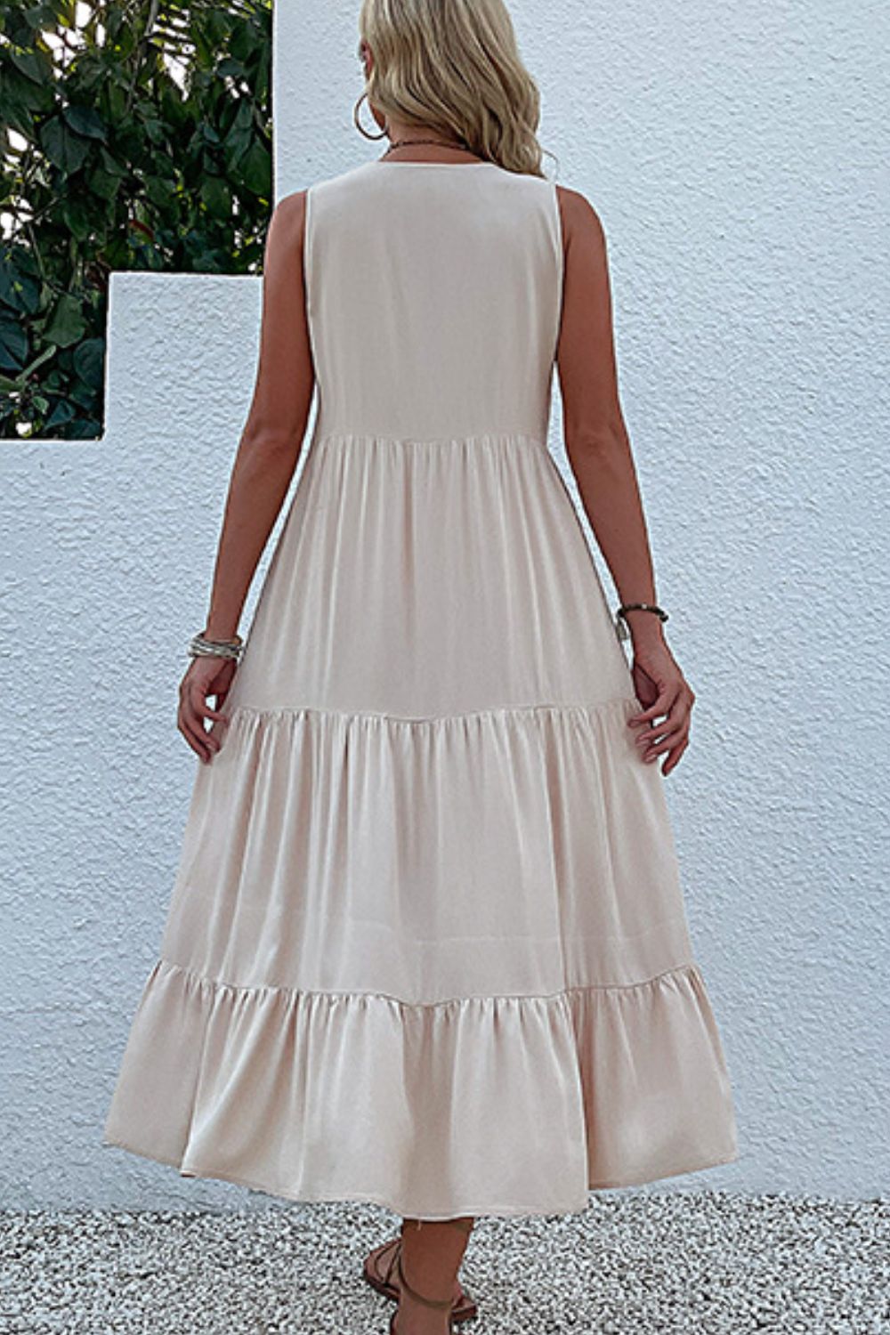 Khaki viscose sleeveless midi dress with tiered ruffle hemline and button-down front.