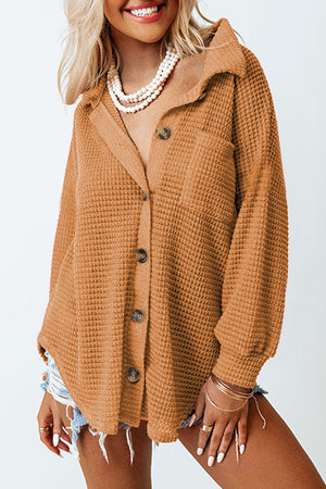 Waffle knit button-down shirt jacket in caramel with a collared neckline and chest pocket.