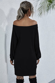Black waffle knit off-shoulder mini dress with long sleeves